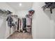 Walk-in closet with ample storage racks and hanging space for organized clothing at 71 Rose Bud Ln, Spring Hill, FL 34609