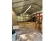 Spacious metal outbuilding interior perfect for storage or workshop with ample lighting at 7644 Conrad St, Wesley Chapel, FL 33544
