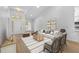 Inviting living room with neutral decor and plenty of natural light at 7644 Conrad St, Wesley Chapel, FL 33544