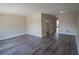 Spacious living room featuring modern flooring and neutral paint, enhancing the bright, open feel at 9217 Tudor Dr # A106, Tampa, FL 33615