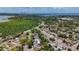 An aerial view showcasing the neighborhood's proximity to the city and the lush greenery surrounding the homes at 922 Alcazar S Way, St Petersburg, FL 33705