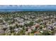 The aerial view features a residential area near the ocean with neat streets and various houses at 922 Alcazar S Way, St Petersburg, FL 33705