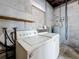 Basement laundry area with washer and dryer at 922 Alcazar S Way, St Petersburg, FL 33705