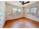 Bedroom featuring windows and original hardwood floors at 922 Alcazar S Way, St Petersburg, FL 33705