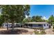 A charming home featuring a well-maintained front yard and a welcoming entrance at 922 Alcazar S Way, St Petersburg, FL 33705
