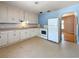 Functional kitchen with appliances and ample counter space, ready for renovation at 922 Alcazar S Way, St Petersburg, FL 33705