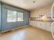 Traditional kitchen featuring ample cabinetry and a window overlooking the backyard at 922 Alcazar S Way, St Petersburg, FL 33705