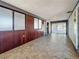 Bright sun room with tile floor and walls of windows overlooking the backyard with sliding glass doors at 922 Alcazar S Way, St Petersburg, FL 33705