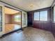 Bright sunroom with gray trimmed windows and doorways, tile flooring and views to the backyard at 922 Alcazar S Way, St Petersburg, FL 33705