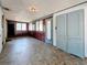 Sunroom with gray flooring and storage cabinet at 922 Alcazar S Way, St Petersburg, FL 33705