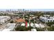 An aerial view showcases the townhouse in an urban area near restaurants, businesses, and apartments at 109 S Packwood Ave # B, Tampa, FL 33606