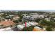An aerial view of the townhouse community, near apartments, businesses, and a bay at 109 S Packwood Ave # B, Tampa, FL 33606