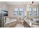 This bathroom features double sinks, a separate tub and shower, and natural lighting at 109 S Packwood Ave # B, Tampa, FL 33606