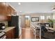 Modern kitchen features stainless steel appliances and is open to an adjacent living area at 109 S Packwood Ave # B, Tampa, FL 33606