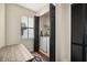 Functional laundry area featuring a washer, dryer, window, and storage at 109 S Packwood Ave # B, Tampa, FL 33606