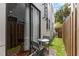 Cozy patio area with table, chairs, and privacy fence at 109 S Packwood Ave # B, Tampa, FL 33606
