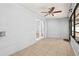 Open lanai with tile flooring perfect for enjoying indoor-outdoor living at 10900 Livingston Dr, New Port Richey, FL 34654
