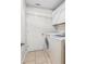 Clean laundry room with tile floors, a washer, and a dryer at 10900 Livingston Dr, New Port Richey, FL 34654