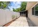 A paved outdoor patio offers a great space for relaxing and entertaining at 10900 Livingston Dr, New Port Richey, FL 34654