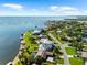 Waterfront homes with stunning views of the bay and easy access to boating and water sports at 110 Carlyle Dr, Palm Harbor, FL 34683