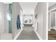 Beautiful bathroom with shower, tiled floors, and bench seat under a bright window at 110 Carlyle Dr, Palm Harbor, FL 34683