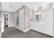 Large Primary bathroom featuring a large vanity, tile floors, and closet access at 110 Carlyle Dr, Palm Harbor, FL 34683