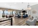 Open concept living room with water view, featuring modern furnishings and elegant decor at 110 Carlyle Dr, Palm Harbor, FL 34683