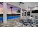 Covered patio with ocean views, pool, and outdoor seating at 110 Carlyle Dr, Palm Harbor, FL 34683