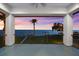 Covered porch featuring water views and privacy, perfect for relaxing evenings at 110 Carlyle Dr, Palm Harbor, FL 34683