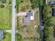 Aerial view of the cozy home and the peaceful backyard running up to the canal at 1110 Canal St, Ruskin, FL 33570