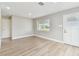 Bright living room with neutral tones, sleek flooring, and ample natural light at 1110 Canal St, Ruskin, FL 33570