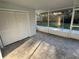 Screened in back porch overlooking the backyard of the home at 1110 Canal St, Ruskin, FL 33570
