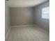Bedroom featuring neutral walls and tile flooring at 116 Cranbrooke Dr, Seffner, FL 33584