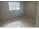 Well-lit bedroom with tile flooring at 116 Cranbrooke Dr, Seffner, FL 33584