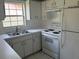 Functional kitchen with white appliances and ample counter space at 116 Cranbrooke Dr, Seffner, FL 33584