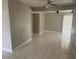 Spacious living room featuring tile floors and natural light at 116 Cranbrooke Dr, Seffner, FL 33584