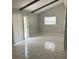 Bright and airy living space with vaulted ceilings and sliding door access at 116 Cranbrooke Dr, Seffner, FL 33584