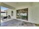 Patio with outdoor seating and sliding glass door leading to the home's dining area at 11728 Crest Creek Dr, Riverview, FL 33569