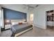 Beautiful bedroom featuring a large bed with closet and bathroom entrance at 11728 Crest Creek Dr, Riverview, FL 33569