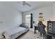 Bedroom with a ceiling fan, a window, and a dark dresser at 11728 Crest Creek Dr, Riverview, FL 33569