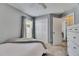 Bedroom with closet, window, and carpet flooring at 11728 Crest Creek Dr, Riverview, FL 33569