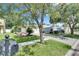 Charming single-story home boasts a well-manicured lawn and inviting curb appeal at 11728 Crest Creek Dr, Riverview, FL 33569