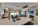 Open-concept kitchen featuring white countertops and an inviting dining area with patio access at 11728 Crest Creek Dr, Riverview, FL 33569
