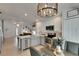 Modern kitchen with stainless steel appliances and open layout to the living area at 11728 Crest Creek Dr, Riverview, FL 33569