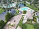 An aerial view featuring community pools, a playground, and a sand play area at 11728 Crest Creek Dr, Riverview, FL 33569