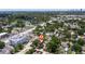 An aerial view showcases the property, surrounded by lush trees and other neighborhood homes at 131 44Th N Ave, St Petersburg, FL 33703