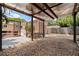 Charming pergola in the backyard with gravel and paver patio at 131 44Th N Ave, St Petersburg, FL 33703
