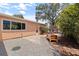 Charming backyard with stone pavers, pea gravel, mature trees and raised garden beds at 131 44Th N Ave, St Petersburg, FL 33703