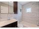 Modern bathroom featuring tiled walls, a shower and tub combination, and updated vanity at 131 44Th N Ave, St Petersburg, FL 33703