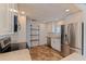 Bright kitchen features white cabinets, granite countertops, and stainless steel appliances at 131 44Th N Ave, St Petersburg, FL 33703